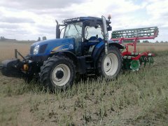 New Holland T6030 + Unia ares TXXL