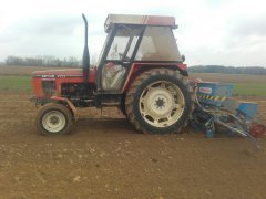 Zetor 7711 + Monosem