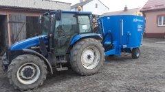 New Holland TL 100 + Paszowóz