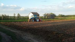 New Holland TS100 + siewnik Meprozet