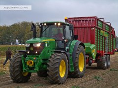 John Deere 6150M z przyczepą Strautmann