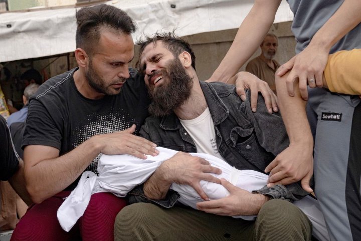 May be an image of 3 people, crowd and text