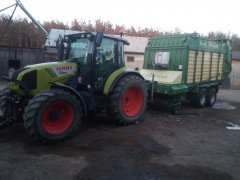 Claas Arion 410 i Krone Titan R44GD