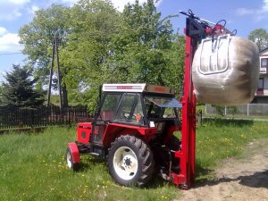 Maszt z chwytakiem do bel