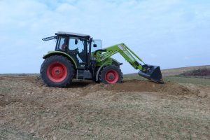 Claas Axos 310 CX