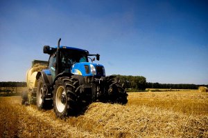 New Holland + Krone Comprima