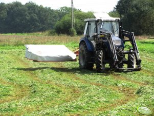 Farmtrac 665 DT & Kuhn GMD 55 Select