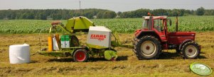 International 1255 XL i Claas Rollant 25O RC