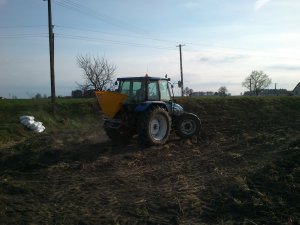 New Holland L75 + Promar