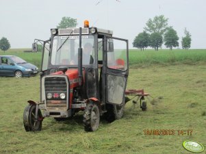 MF 255 i Przetrząsacz karuzerowy Jar Met