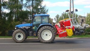 New Holland TM120 + Pottinger Vitasem 302A