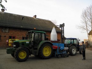 John Deere 6330 i New Holland T4020