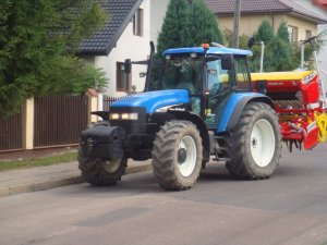 New Holland TM120 + Pottinger Vitasem 302A