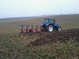 New Holland TM125 + Unia Ibis