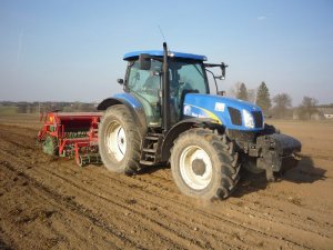 New Holland T6050 plus    Unia  Ares XL I POLONEZ D.  3m