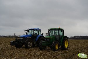 John Deere 6400 i New Holland TM 125