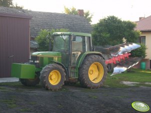 John Deere 6400 + Kuhn Master 102 3+1