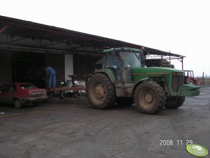 John Deere 8100 z pługiem