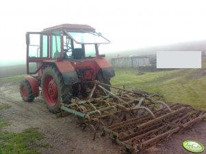 MTZ 82 + Agregatem uprawowy UG 2,8