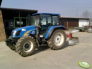 New Holland T5050 + Unia Ibis M 3+