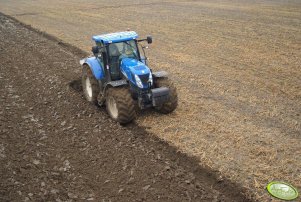 New Holland T7030AC + Unia ibis xxls 5 vario