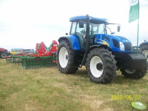 New Holland T7550 + Unia