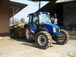 New Holland TL100A + Agregat Unia