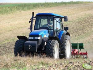 New Holland TM 120 + Unia Kos