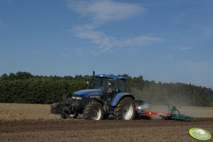 New Holland TM 125 i Kverneland EM 100