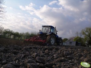 New Holland TM120 + Unia Ares