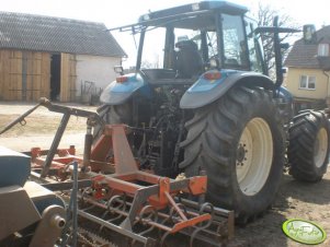 New Holland TM150 + agregat uprawowo-siewny