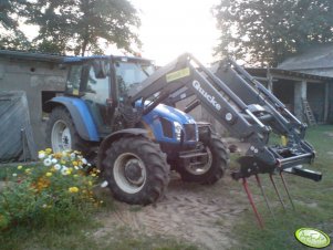 NH TL 100A + ładowacz Quicke