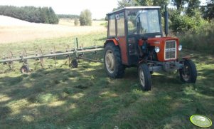 Ursus C-335M z zgrabiarko-przewracarką