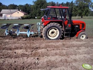 Zetor 6911 + Brening pług 3 skibowy obrotowy