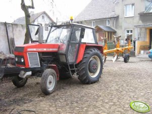 Zetor 8111(C-385)+pług obrotowy Kuhn 3+1