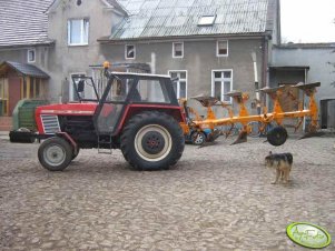 Zetor 8111(C-385)+pług obrotowy Kuhn 3+1