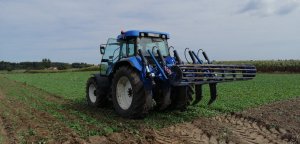 New Holland T7550 +Rolmako U602/3