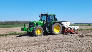 John Deere 6630 i Kuhn Kosma