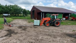 Kubota m7060 wozimy deszczówkę 