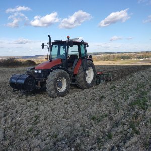 New Holland L95 + Unia CutL