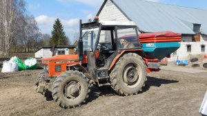 Zetor 7045 i rozsiewacz Sulky DPX Expert