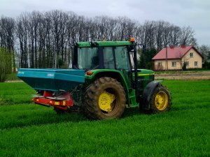 John Deere 6110 & Sulky dpx1004