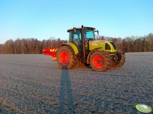 Claas Arion 630 C.I.S & rozsiewacz