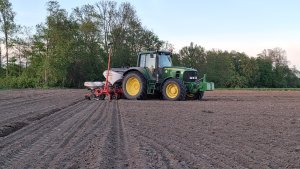 John Deere 6630 i Kuhn Kosma